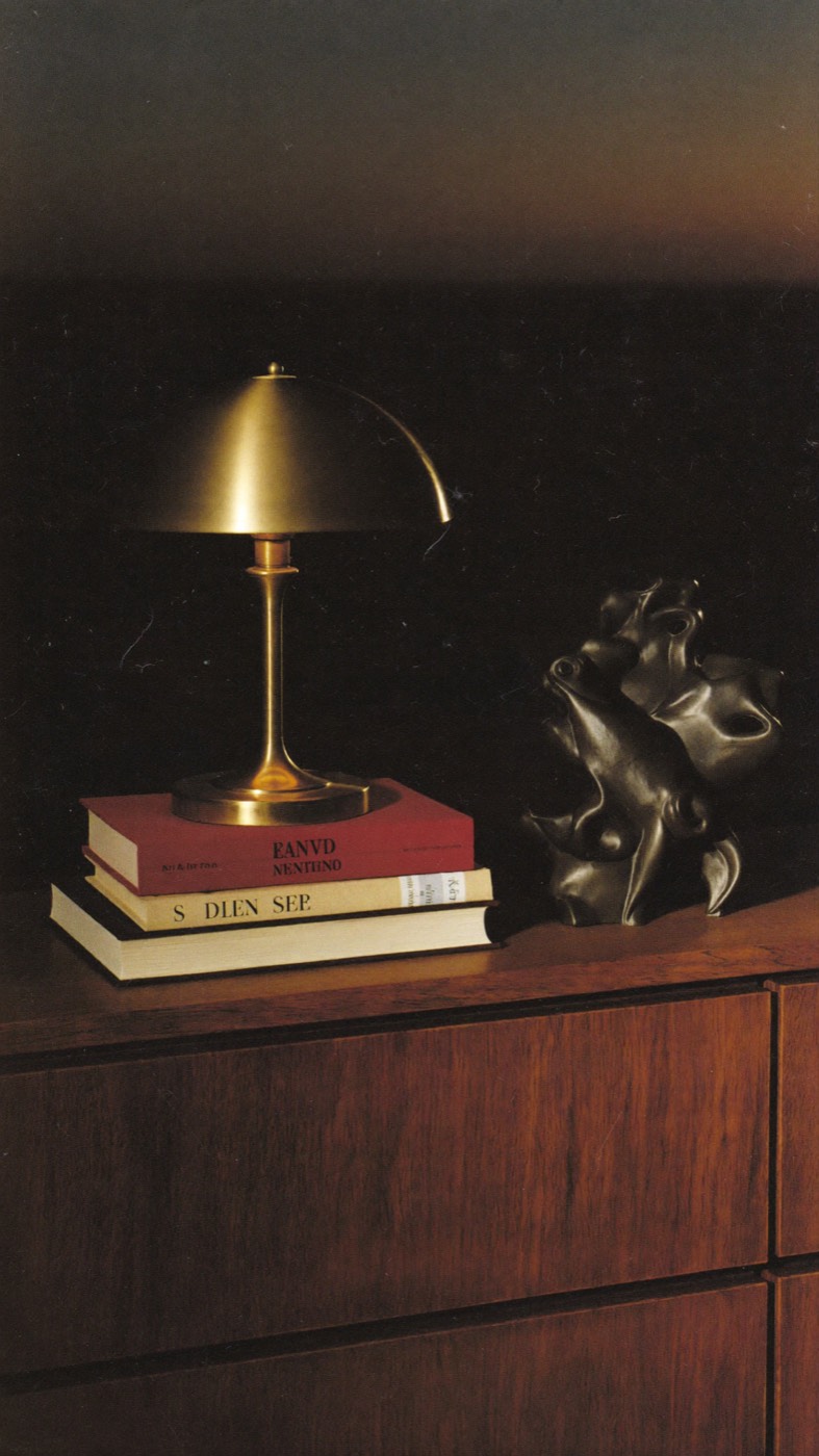 Brass lamp on books